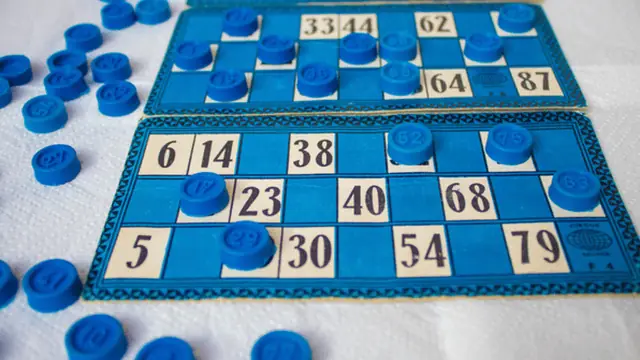 Bingo card with chips and markers like those at Dollar Tree