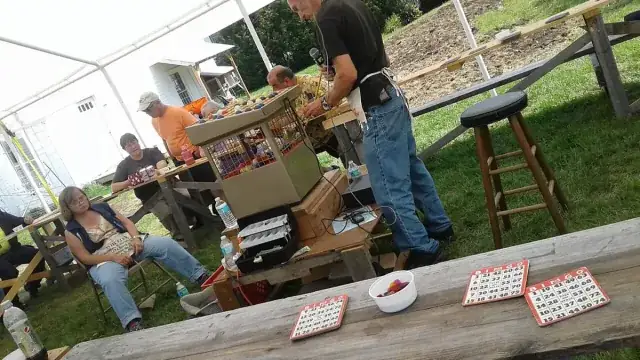 Outdoor bingo fundraiser event using daubers