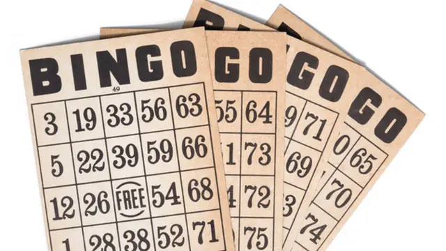 People playing bingo together at a community event