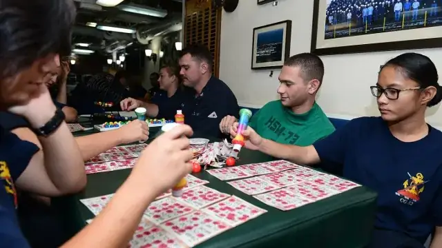 Players concentrating on their bingo cards