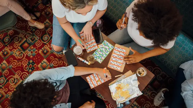 Kids playing educational bingo with non-toxic daubers